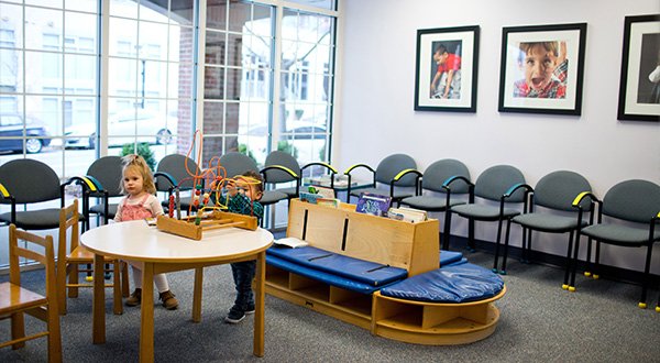 toddler standing in the waiting room